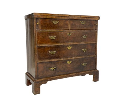 20th century Georgian style figured walnut bachelor's chest, crossbanded and moulded fold-over top, fitted with two short and