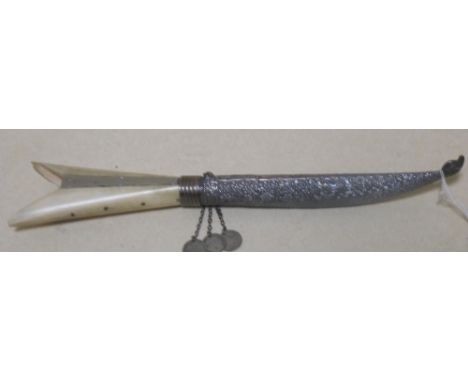 An Eastern bone handled dagger with silver scabbard  