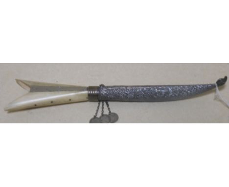 An Eastern bone handled dagger with silver scabbard  