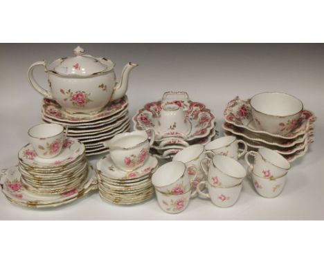 A Victorian part dessert service with floral decoration, and a part tea service in 'Pinxton Roses' pattern by Royal Crown Der