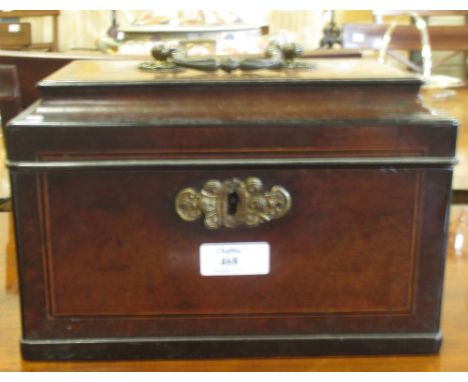 A 19th century mahogany tea caddy with crossbanded top  