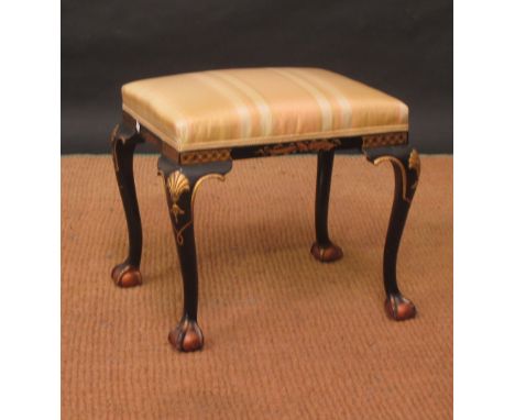 A Queen Anne style black japanned stool on cabriole legs  