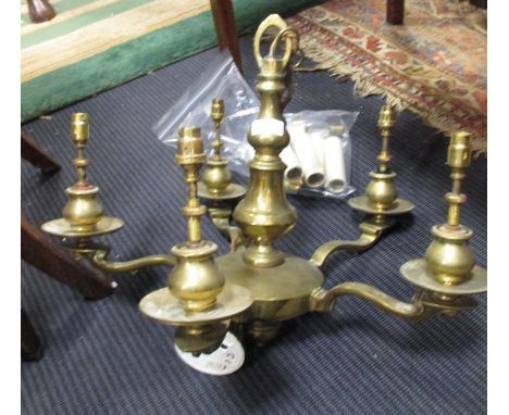 A brass five branch ceiling light  