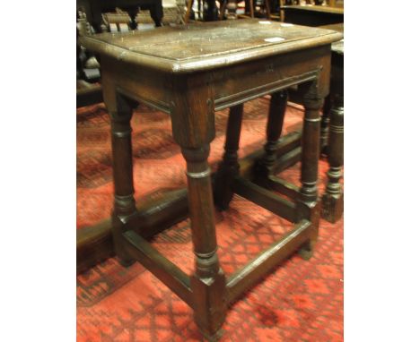 A 17th century oak joint stool, stamped WI, 56cm x 45cm  