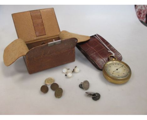 A Short and Mason pocket barometer retailed by Selfridge, London and two pairs of cufflinks, mother of pearl buttons and stud
