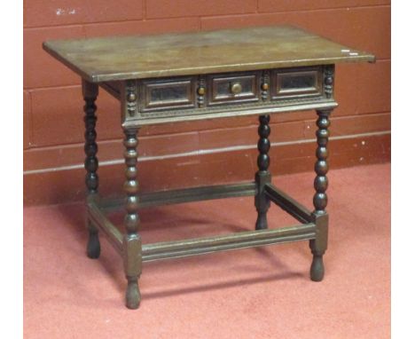 An 18th century oak side table on bobbin turned legs, 73 x 87 x 58cm  