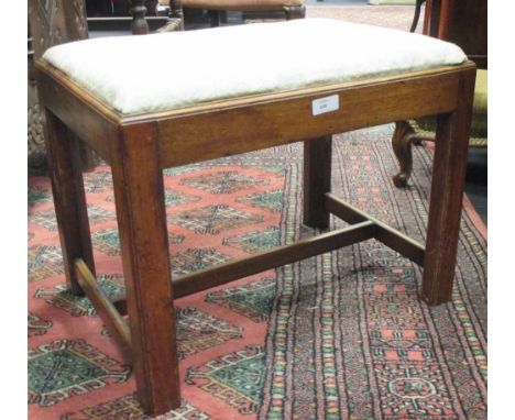 A George III mahogany dining stool  