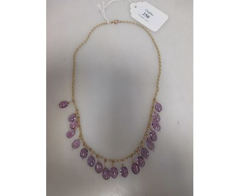 An amethyst and 9ct gold fringe necklace  