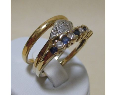 A 22ct wedding band (2.7g), a 9ct sapphire and diamond ring, size P, and a diamond set ring stamped '9ct' (3)  