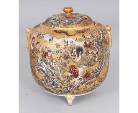 A SIGNED JAPANESE MEIJI PERIOD SATSUMA EARTHENWARE TRIPOD KORO & COVER, the sides painted with Sennin in the company of a dra