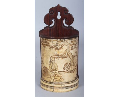 AN UNUSUAL CHINESE WOOD & IVORY WALL POCKET, the semi-circular side carved with a scene of two sages playing Go, 3in wide at 