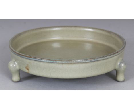 A CHINESE SONG STYLE RU WARE CELADON PORCELAIN TRIPOD CENSER, the base with spur marks, 5.9in diameter at rim & 1.6in high.