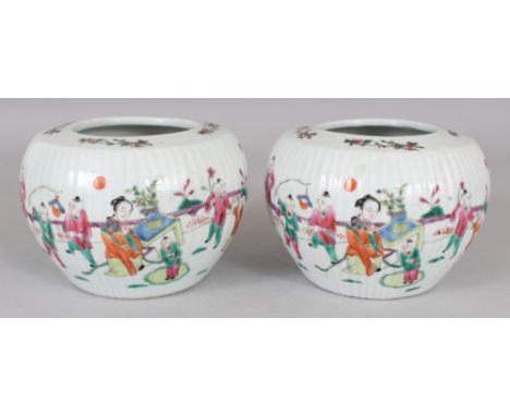 A PAIR OF CHINESE FAMILLE ROSE FLUTED PORCELAIN JARS, each base with a Tongzhi seal mark, 6.2in wide at widest point & 4.3in 