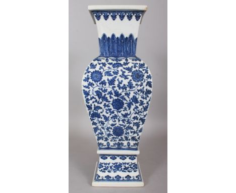 A LARGE GOOD QUALITY CHINESE MING STYLE BLUE & WHITE PORCELAIN SQUARE SECTION VASE, decorated with formal foliate grounds and