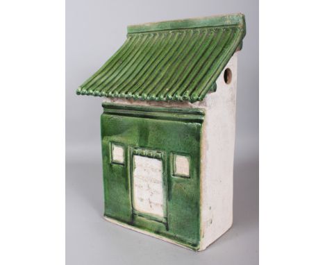 A CHINESE HAN STYLE GREEN GLAZED CERAMIC TOMB MODEL OF A HOUSE, 9in x 6in x 15.2in high.