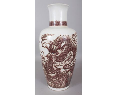 A LARGE CHINESE COPPER RED PORCELAIN DRAGON VASE, the base with a six-character Kangxi mark, 17.6in high.