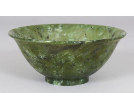 A 20TH CENTURY CHINESE JADE-LIKE HARDSTONE BOWL, the predominantly green stone with lighter and darker mottled inclusions, 5.