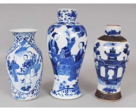 A GROUP OF THREE LATE 19TH CENTURY CHINESE BLUE & WHITE PORCELAIN VASES, one crackleglaze, the other two each with a four-cha