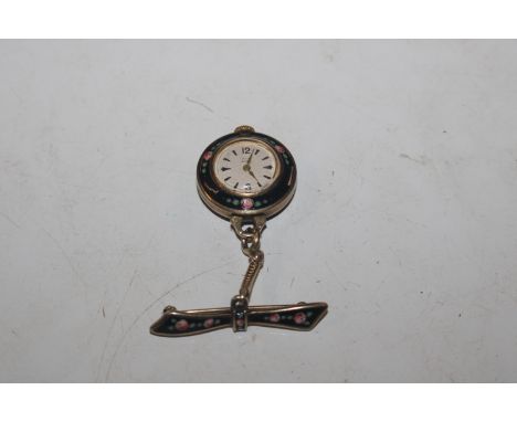 A silver gilt ladies pendant watch with black and floral enamel decoration