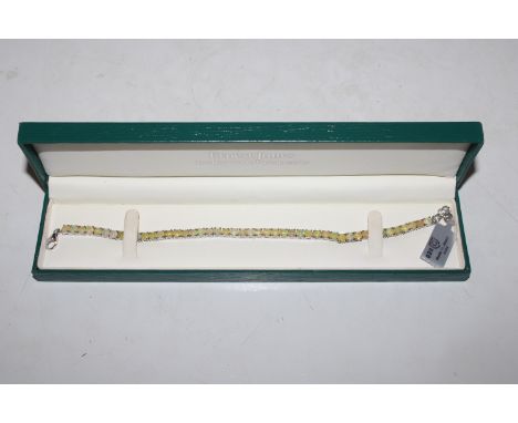 A Sterling silver and opal tennis bracelet, approx. 16gms 