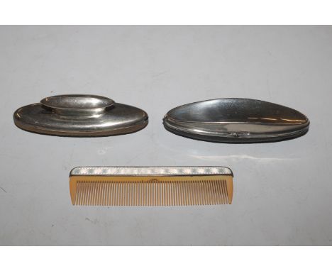 A bag containing two silver mounted nail buffers, and enamel and silver mounted comb 