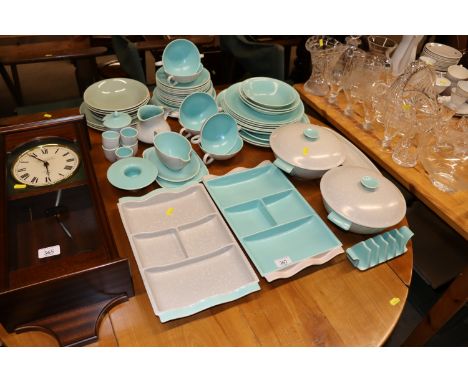 A quantity of Poole pottery twin tone dinnerware 