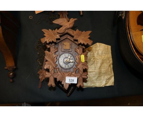 A small Black Forest type cuckoo clock 