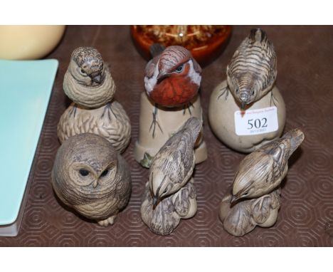 A quantity of Poole pottery birds 