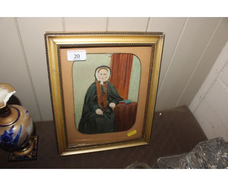 A framed and glazed portrait study of a seated Victorian lady wearing a bonnet