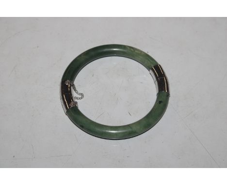 A Nephrite, jade and white metal bangle 