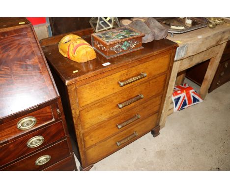 A 1930's oak chest of four drawers 