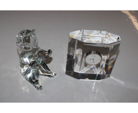 A Orrefors glass clock and a Swedish glass model of a bear, signed to base 