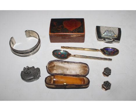 A box containing white metal bangle, Noah's Ark brooch, cloisonné decorated spoons etc.