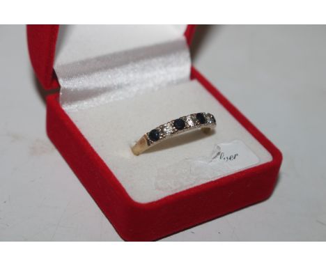 A 9ct gold ring set with blue and white stones, ring size U, approx. total wright 1.8gms 