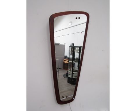 A vintage 1960's mirror of abstract form on teak backing, 73cm x 35cm 