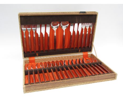 A vintage Dutch stainless steel full canteen of cutlery with wooden handles in original box. Box 47cm x 28cm x 7cm 