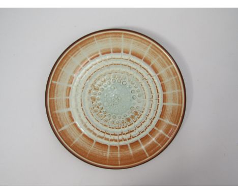 A Poole Atlantis plate designed by Guy Sydenham and Susan Dipple. 26cm diameter 