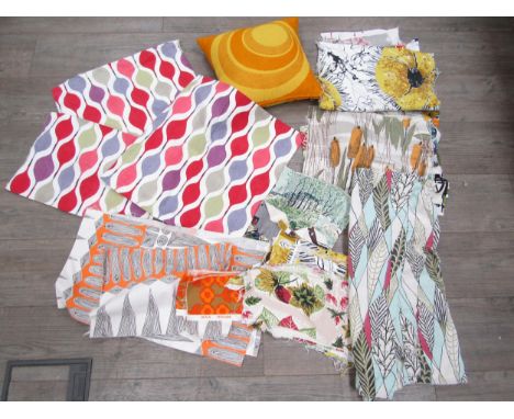 A collection of vintage miscellaneous small fabric remnants and cushions including Heals, Peter Hall etc 