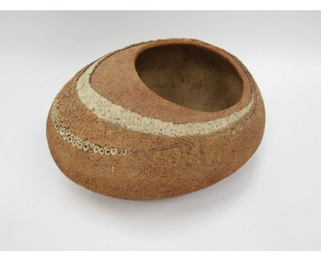 A pebble form planter pot by Nigel Edmondson, rough layered textured body. 33cm long 