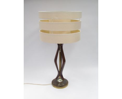 An original 1970's teak and brass metal lamp base and shade, 70cm high 