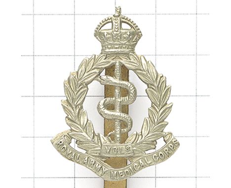 Royal Army Medical Corps Volunteers Edwardian OR’s cap badge circa 1902-08. Die-stamped white metal crowned laurel sprays on 