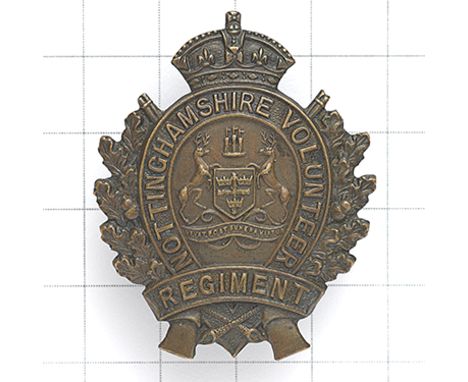 Nottinghamshire Volunteer Regiment WW1 VTC cap badge Die-stamped bronze crowned horseshoe title scroll superimposed on crosse