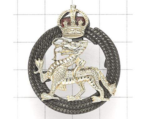 Royal Berkshire Regiment Officer’s pre 1952 beret badge. Bronze coil of rope mounted with silvered dragon with crown above. R