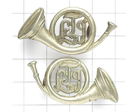 South Africa. Transvaal Light Infantry facing pair of collars circa 1903-07 Scarce die-stamped white metal French horns, “TLI
