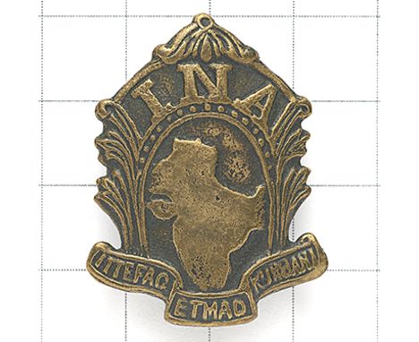 Indian National Army (Azad Hind) bronzed cap badge circa 1942-45. Locally die-stamped map of India surmounted by ‘I.N.A’ and 