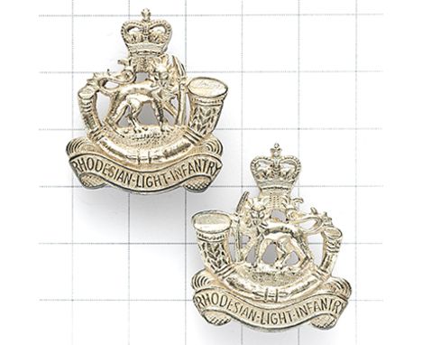 Rhodesian Light Infantry facing pair of Officer’s silver collars circa 1962-74. Die-stamped unmarked crowned strung bugle wit
