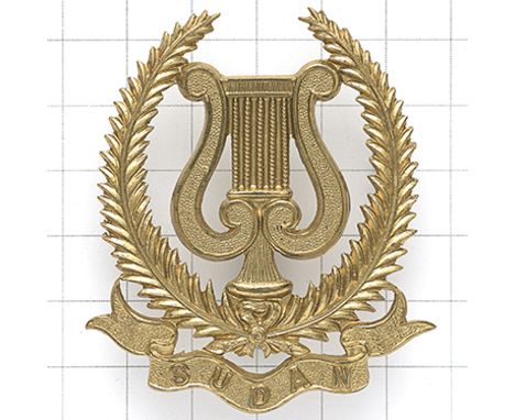 Sudan Army Band scarce head-dress badge. Die-cast brass lyre in fern sprays on “SUDAN” scroll  Loops VGC 
