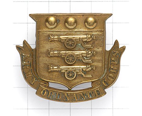 Army Ordnance Corps large Victorian OR’s large brass cap badge. Die-stamped shield bearing Ordnance Arms resting in title scr