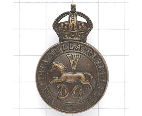 5th Dragoon Guards OSD bronze cap badge circa 1902-22. Die-cast crowned motto circlet, centre bearing horse between ‘V DG’.  