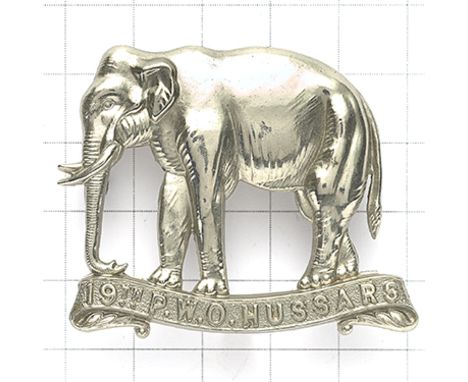 19th Princess of Wales’s Own Hussars OR's cap badge circa 1898-1902. Die-stamped white metal elephant on single scroll “19TH 